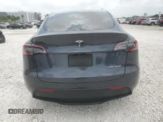 2024 Tesla Model Y Long Range с VIN 7SAYGDEE7RA279293, выставлен на аукционе Copart как лот 62758065 с пробегом 23 271 миль миль и Списание • Salvage title. История ставок и продаж доступна на DreamBid. Изображение 6.