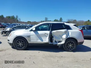 2013 Cadillac SRX Performance Collection with VIN 3GYFNDE33DS637155, listed as a IAAI auction lot 41977706 with 140,668 mi miles and . Bid and sale history available at DreamBid. Image 14.