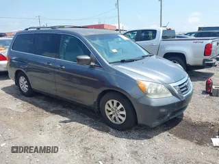 2010 Honda Odyssey EX with VIN 5FNRL3H42AB110879, listed as a IAAI auction lot 42257313 with 197,190 mi miles and . Bid and sale history available at DreamBid. Image 1.