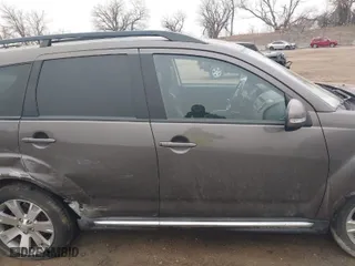 2013 Mitsubishi Outlander SE with VIN JA4JT3AW2DU013681, listed as a IAAI auction lot 41722425 with 95,145 mi miles. Bid and sale history available at carsss.com. Image 13.