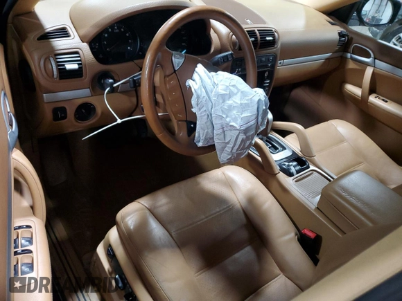 2009 Porsche Cayenne z VIN WP1AA29P99LA04751, wystawiony jako Copart lot #45877405 z przebiegiem Nie podano mil oraz Szkoda całkowita • Salvage title. Historia ofert i sprzedaży dostępna na DreamBid. Obrazek 8.