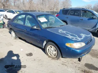 1998 Ford Escort SE with VIN 1FAFP13P4WW288248, listed as a IAAI auction lot 41456179 with 223,155 mi miles. Bid and sale history available at carsss.com. Image 1.