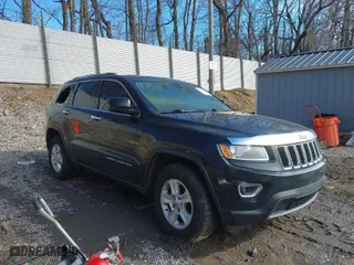 2015 Jeep Grand Cherokee Laredo with VIN 1C4RJFAG9FC909753, listed as a IAAI auction lot 41705871 with 120,000 mi miles. Bid and sale history available at carsss.com. Image 1.
