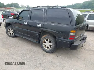 2003 GMC Yukon Denali z VIN 1GKEK63U23J155699, wystawiony jako IAAI lot #42419936 z przebiegiem 197 218 mil mil oraz . Historia ofert i sprzedaży dostępna na DreamBid. Obrazek 3.