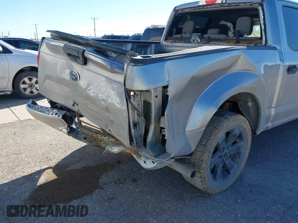 2020 Ford F-150 XL with VIN 1FTEW1C58LFA64029, listed as a IAAI auction lot 38736802 with 92,698 mi miles and . Bid and sale history available at DreamBid. Image 6.