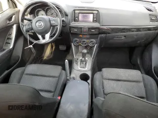 2015 Mazda CX-5 Touring with VIN JM3KE4CY0F0517821, listed as a Copart auction lot 53937195 with 165,852 mi miles and Salvage Title. Bid and sale history available at DreamBid. Image 8.