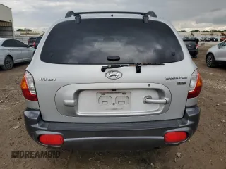 2004 Hyundai Santa Fe GLS with VIN KM8SC13E34U701350, listed as a Copart auction lot 58671145 with 192,274 mi miles and Salvage title. Bid and sale history available at DreamBid. Image 6.