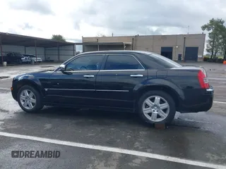 2006 Chrysler 300 C with VIN 2C3LK63H66H142437, listed as a IAAI auction lot 41751890 with 57,374 mi miles. Bid and sale history available at carsss.com. Image 14.