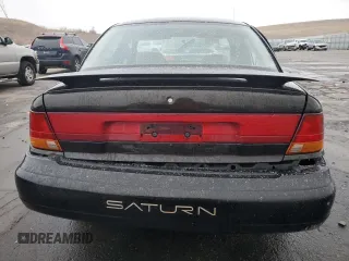 1996 Saturn SL с VIN 1G8ZK5276TZ240883, выставлен на аукционе Copart как лот 84172554 с пробегом 69 820 миль миль и Списание • Salvage title. История ставок и продаж доступна на DreamBid. Изображение 6.