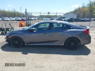 2020 Honda Civic Si z VIN 2HGFC1E53LH704576, wystawiony jako IAAI lot #41979301 z przebiegiem 59 245 mil mil oraz . Historia ofert i sprzedaży dostępna na DreamBid. Obrazek 15.