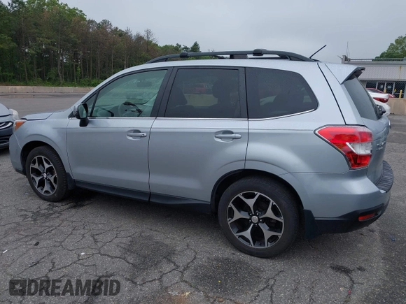 2014 Subaru Forester XT Touring with VIN JF2SJGMC1EH552474, listed as a IAAI auction lot 42461663 with 121,482 mi miles and . Bid and sale history available at DreamBid. Image 3.
