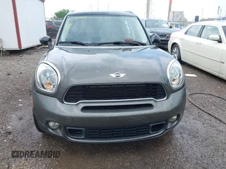 2011 MINI Countryman S with VIN WMWZC5C53BWM11022, listed as a IAAI auction lot 42249403 with 173,718 mi miles and . Bid and sale history available at DreamBid. Image 12.