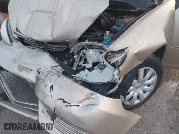 2005 Toyota Camry STD with VIN 4T1BE32K55U019844, listed as a IAAI auction lot 41766436 with 203,251 mi miles and . Bid and sale history available at DreamBid. Image 6.