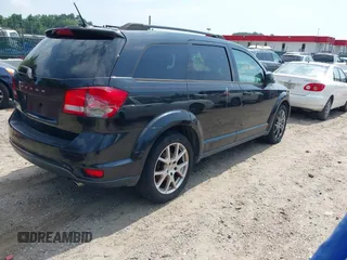 2012 Dodge Journey SXT with VIN 3C4PDDBG3CT144881, listed as a IAAI auction lot 42844117 with 184,804 mi miles and . Bid and sale history available at DreamBid. Image 4.