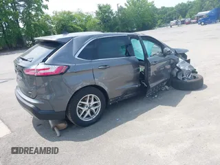 2022 Ford Edge SEL z VIN 2FMPK4J95NBA79440, wystawiony jako IAAI lot #42420918 z przebiegiem Nie podano mil oraz . Historia ofert i sprzedaży dostępna na DreamBid. Obrazek 4.