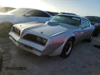 1977 Pontiac Firebird z VIN 2W87Z7N152633, wystawiony jako Copart lot #41438935 z przebiegiem 17 837 mil mil oraz Nie do naprawy. Historia ofert i sprzedaży dostępna na DreamBid. Obrazek 1.