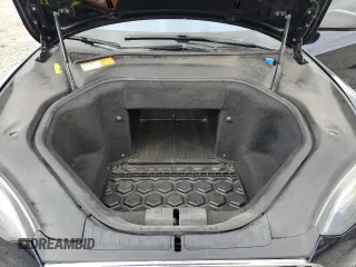 2013 Tesla Model S Performance с VIN 5YJSA1DP9DFP05325, выставлен на аукционе Copart как лот 52617545 с пробегом 122 847 миль миль и Списание • Salvage title. История ставок и продаж доступна на DreamBid. Изображение 11.