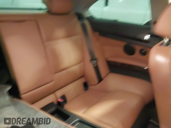 2009 BMW 3 Series 335i with VIN WBAWB735X9P046506, listed as a IAAI auction lot 41499455 with 97,453 mi miles and . Bid and sale history available at DreamBid. Image 8.