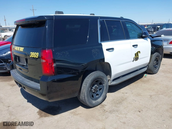 2017 Chevrolet Tahoe Commercial with VIN 1GNLCDEC2HR187691, listed as a IAAI auction lot 40101169 with 87,772 mi miles. Bid and sale history available at carsss.com. Image 4.