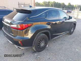 2017 Lexus RX 350 with VIN 2T2BZMCA1HC120042, listed as a IAAI auction lot 42782868 with 100,199 mi miles and . Bid and sale history available at DreamBid. Image 4.