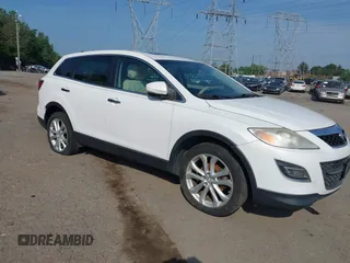 2011 Mazda CX-9 Grand Touring z VIN JM3TB3DV4B0304893, wystawiony jako IAAI lot #42478554 z przebiegiem Nie podano mil oraz . Historia ofert i sprzedaży dostępna na DreamBid. Obrazek 1.