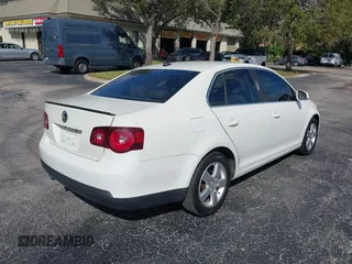 2008 Volkswagen Jetta Sedan SE with VIN 3VWRM71K08M108404, listed as a IAAI auction lot 41595159 with 125,031 mi miles. Bid and sale history available at carsss.com. Image 4.