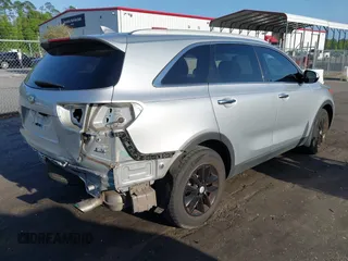 2016 Kia Sorento LX with VIN 5XYPG4A57GG069736, listed as a IAAI auction lot 41954474 with 131,150 mi miles. Bid and sale history available at carsss.com. Image 4.