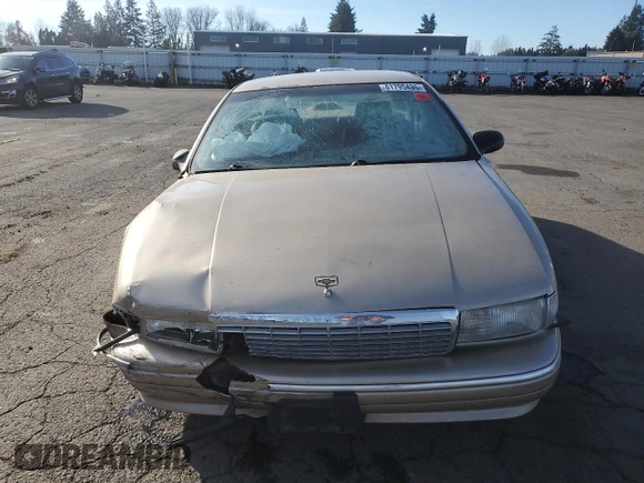 1995 Chevrolet Caprice z VIN 1G1BL52W8SR129349, wystawiony jako Copart lot #41795435 z przebiegiem Nie podano mil oraz Szkoda całkowita • Salvage title. Historia ofert i sprzedaży dostępna na DreamBid. Obrazek 5.