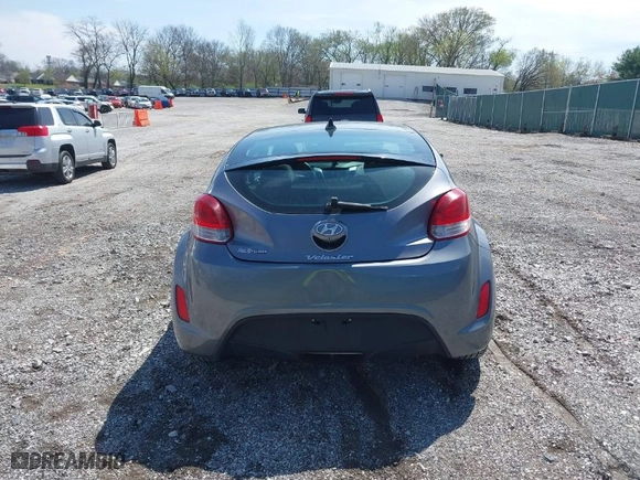 2017 Hyundai Veloster with VIN KMHTC6AD8HU305853, listed as a IAAI auction lot 41915404 with 115,663 mi miles. Bid and sale history available at carsss.com. Image 16.