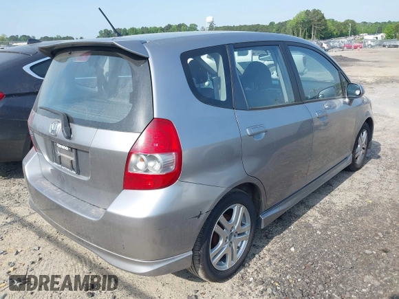 2008 Honda Fit Sport with VIN JHMGD386X8S058659, listed as a IAAI auction lot 42168584 with 210,589 mi miles. Bid and sale history available at carsss.com. Image 4.