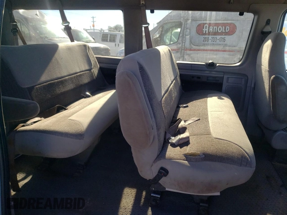 1999 Ford Econoline Passenger XL with VIN 1FBSS31L6XHB60672, listed as a Copart auction lot 79319714 with 295,551 mi miles and Clean Title. Bid and sale history available at DreamBid. Image 11.
