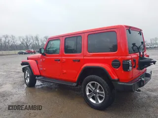 2020 Jeep Wrangler Unlimited Sahara with VIN 1C4HJXEN3LW232316, listed as a IAAI auction lot 42009794 with 35,535 mi miles. Bid and sale history available at carsss.com. Image 3.