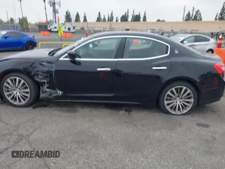 2015 Maserati Ghibli z VIN ZAM57XSA4F1151843, wystawiony jako IAAI lot #38392898 z przebiegiem 88 147 mil mil oraz . Historia ofert i sprzedaży dostępna na DreamBid. Obrazek 14.