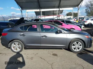 2013 Acura ILX Hybrid Technology z VIN 19VDE3F71DE300659, wystawiony jako IAAI lot #41754346 z przebiegiem 84 061 mil mil oraz . Historia ofert i sprzedaży dostępna na DreamBid. Obrazek 13.