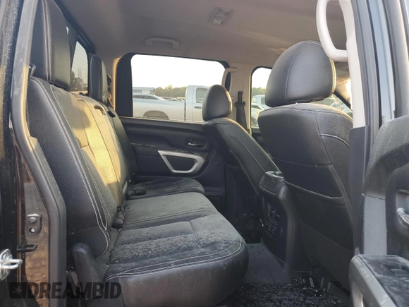 2019 Nissan Titan Pro-4X z VIN 1N6AA1E53KN525603, wystawiony jako Copart lot #77336264 z przebiegiem 64 507 mil mil oraz Szkoda całkowita • Salvage title. Historia ofert i sprzedaży dostępna na DreamBid. Obrazek 10.