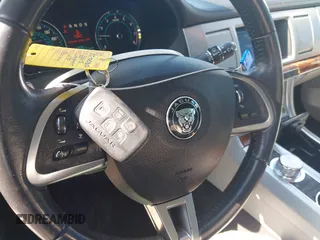 2015 Jaguar XF T Premium with VIN SAJWA0FS0FPU43248, listed as a IAAI auction lot 41977730 with 105,086 mi miles and . Bid and sale history available at DreamBid. Image 11.