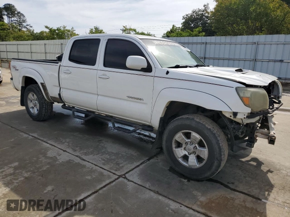 2010 Toyota Tacoma z VIN 5TEMU4FN7AZ710076, wystawiony jako Copart lot #56384345 z przebiegiem 215 043 mil mil oraz Szkoda całkowita • Salvage title. Historia ofert i sprzedaży dostępna na DreamBid. Obrazek 4.