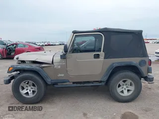 2005 Jeep Wrangler X with VIN 1J4FA39S55P350696, listed as a IAAI auction lot 42367283 with 117,941 mi miles and . Bid and sale history available at DreamBid. Image 14.