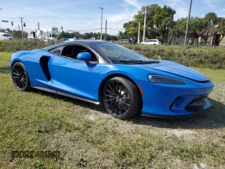 2020 McLaren GT z VIN SBM22GCA8LW000692, wystawiony jako Copart lot #44749324 z przebiegiem 18 911 mil mil oraz Nie do naprawy. Historia ofert i sprzedaży dostępna na DreamBid. Obrazek 4.