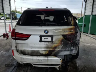 2015 BMW X5 M z VIN 5YMKT6C55F0C89468, wystawiony jako Copart lot #75391074 z przebiegiem Nie podano mil oraz Szkoda całkowita • Salvage title. Historia ofert i sprzedaży dostępna na DreamBid. Obrazek 6.