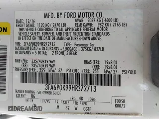 2017 Ford Fusion Titanium with VIN 3FA6P0K99HR272713, listed as a IAAI auction lot 41757334 with 104,733 mi miles. Bid and sale history available at carsss.com. Image 9.