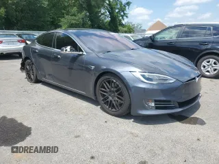 2017 Tesla Model S 100D with VIN 5YJSA1E24HF191280, listed as a Copart auction lot 62598095 with 57,262 mi miles and Clean title. Bid and sale history available at DreamBid. Image 4.