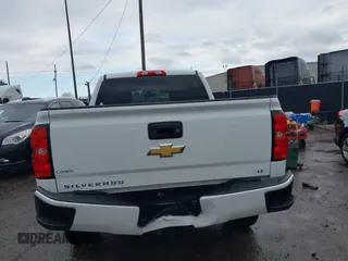 2018 Chevrolet Silverado 1500 LT with VIN 3GCUKREC3JG453433, listed as a IAAI auction lot 38138441 with 53,496 mi miles. Bid and sale history available at carsss.com. Image 16.