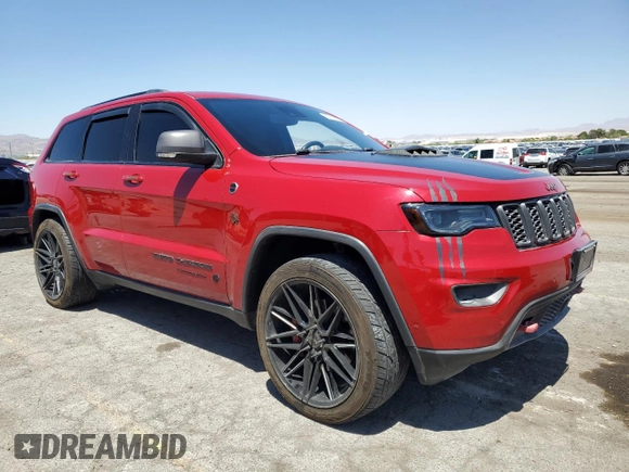 2019 Jeep Grand Cherokee Trailhawk with VIN 1C4RJFLT4KC787940, listed as a Copart auction lot 60883895 with 77,160 mi miles and Salvage title. Bid and sale history available at DreamBid. Image 4.
