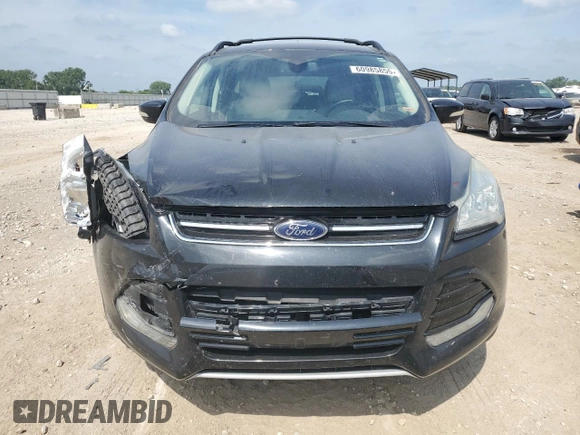 2013 Ford Escape SEL z VIN 1FMCU9HXXDUD65870, wystawiony jako Copart lot #60985855 z przebiegiem 139 440 mil mil oraz Szkoda całkowita • Salvage title. Historia ofert i sprzedaży dostępna na DreamBid. Obrazek 5.