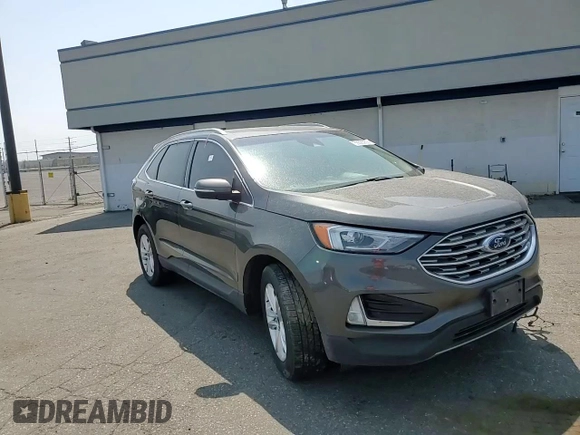 2019 Ford Edge SEL with VIN 2FMPK4J95KBB76844, listed as a Copart auction lot 59323925 with 122,326 mi miles and Salvage title. Bid and sale history available at DreamBid. Image 14.