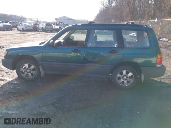 1999 Subaru Forester L with VIN JF1SF635XXH735202, listed as a IAAI auction lot 41489355 with 290,000 mi miles. Bid and sale history available at carsss.com. Image 14.