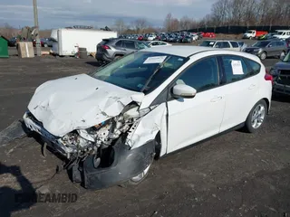 2013 Ford Focus SE with VIN 1FADP3K23DL278608, listed as a IAAI auction lot 42025876 with 142,426 mi miles and . Bid and sale history available at carsss.com. Image 2.