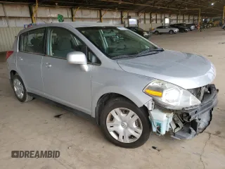 2010 Nissan Versa 1.8 SL with VIN 3N1BC1CP7AL405424, listed as a Copart auction lot 66941474 with 143,410 mi miles and Salvage Title. Bid and sale history available at carsss.com. Image 4.