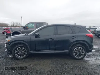 2016 Mazda CX-5 Grand Touring z VIN JM3KE4DY5G0742686, wystawiony jako IAAI lot #41598719 z przebiegiem 117 643 mil mil oraz . Historia ofert i sprzedaży dostępna na DreamBid. Obrazek 15.
